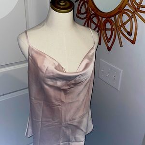 A creamy blush colored silk top from glam